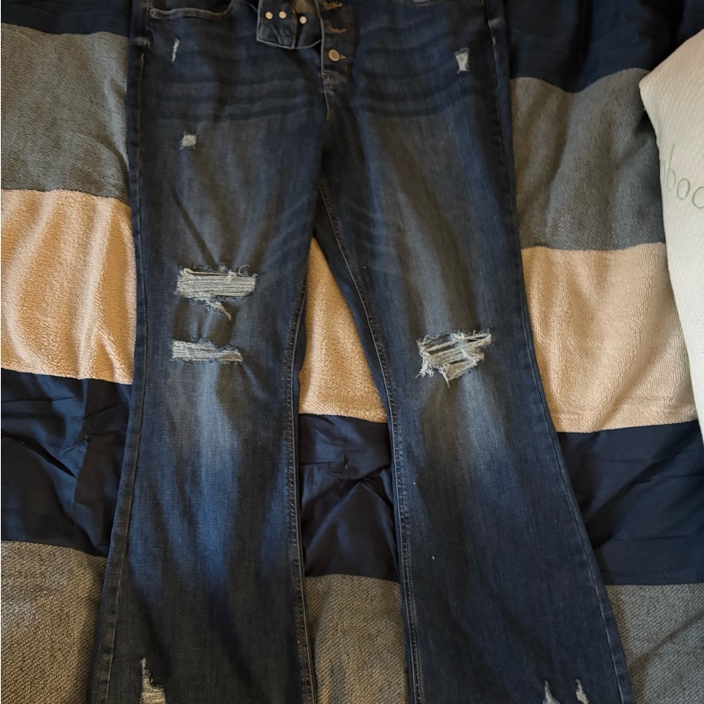 Five pairs of jeans, Maurices size 18, and a few Old Navy size 20 fit like 18